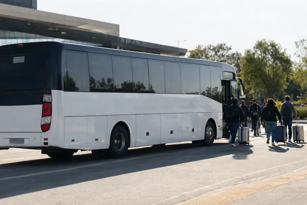 Coach at a Bilal Travels terminal while passengers board